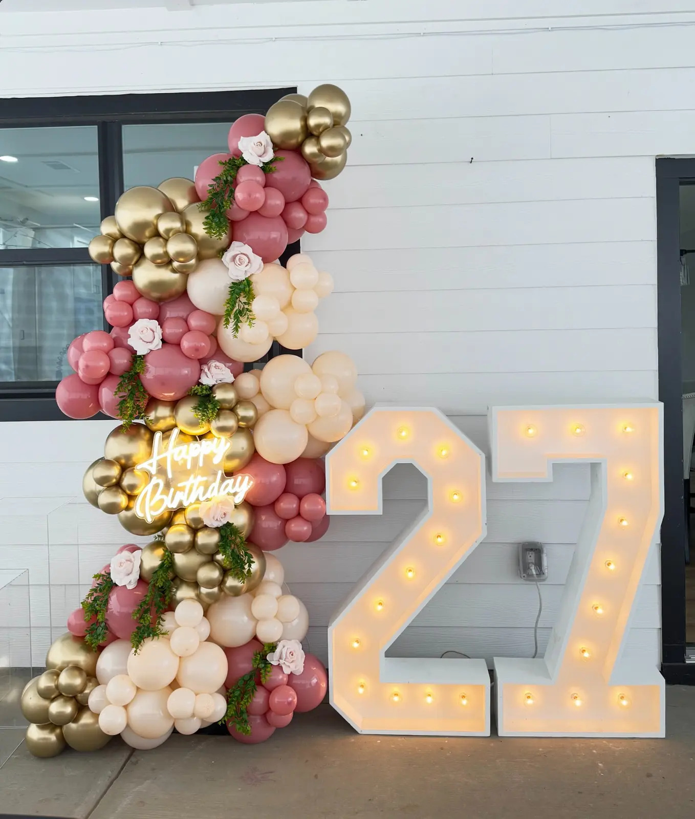 Twenty-seven marquee numbers with balloons